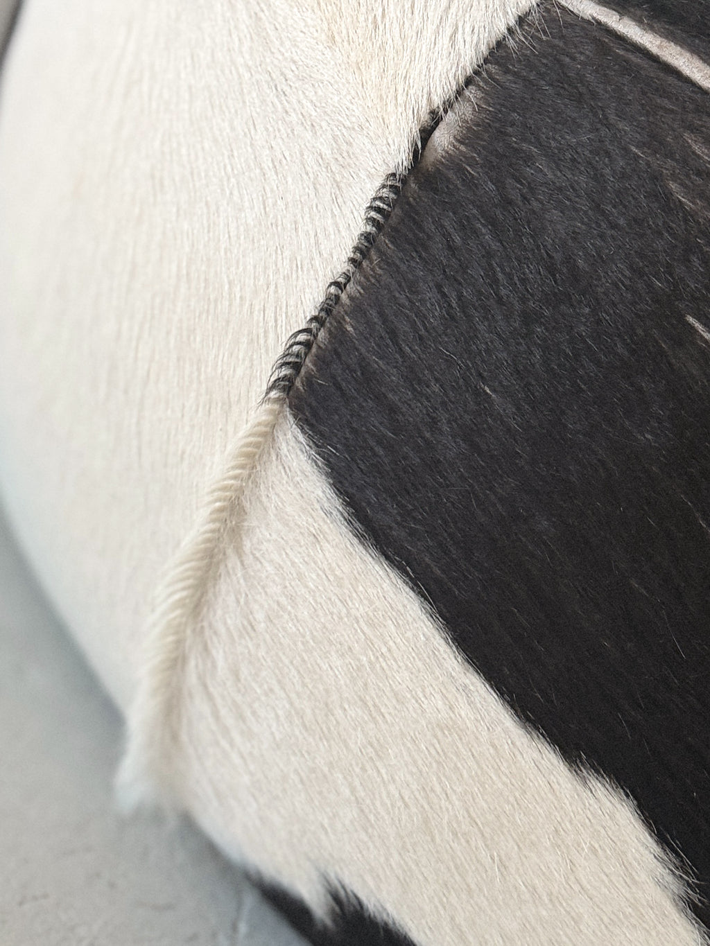 Round Cowhide Ottoman