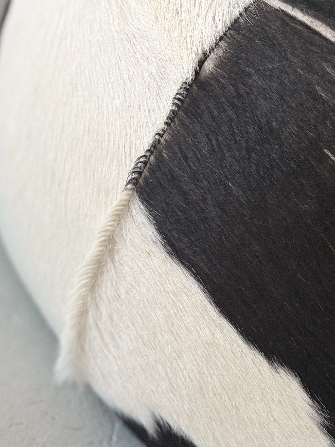Round Cowhide Ottoman