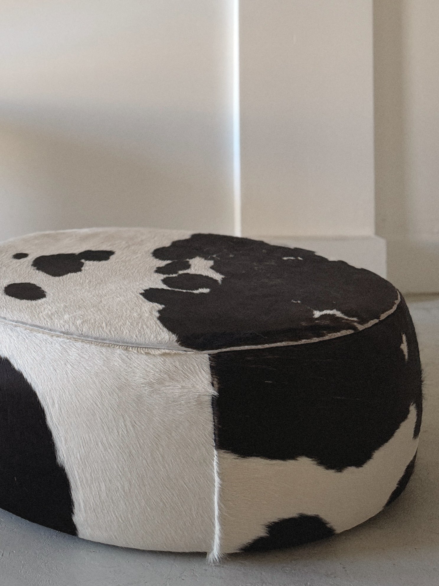 Round Cowhide Ottoman