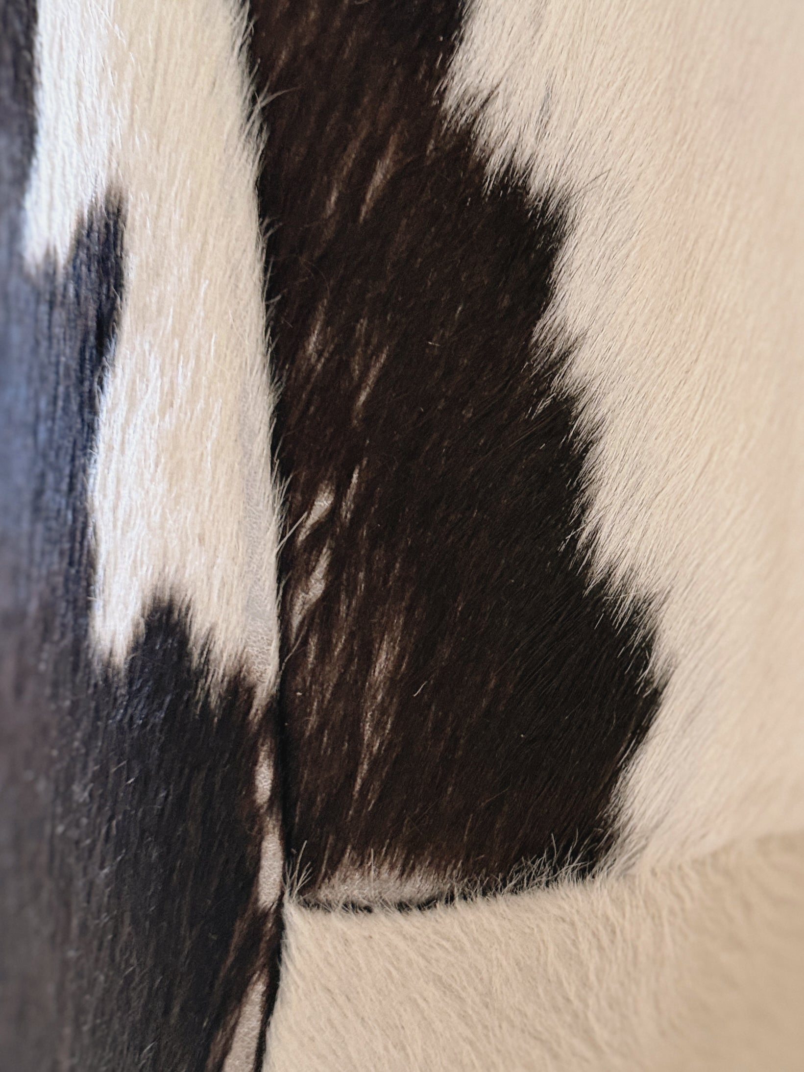 Round Cowhide Ottoman
